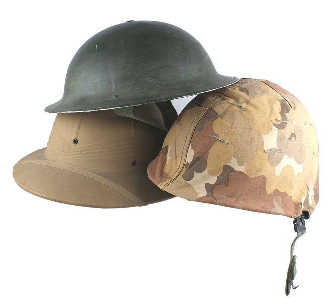 Lot /3 U.S. helmets M1917 A-1 etc: E-042 Lot of 3 U.S. helmets: (1) M1917 A1 WWII issued helmet. Smooth green finish. Top rivet holds a sponge rubber head cushion and rubberized liner. Web chinstrap. Brim dated "1942". (2) WWII O.D. pi