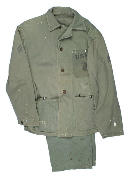 USMC WWII HBT uniform: F-080 USMC WWII HBT uniform. Consists of the M1941 jacket with 3 pockets (snap buttons have been added). Black stenciled "USMC" and "EGA" on chest pocket and painted Sergeant's stripes on each arm. Sh