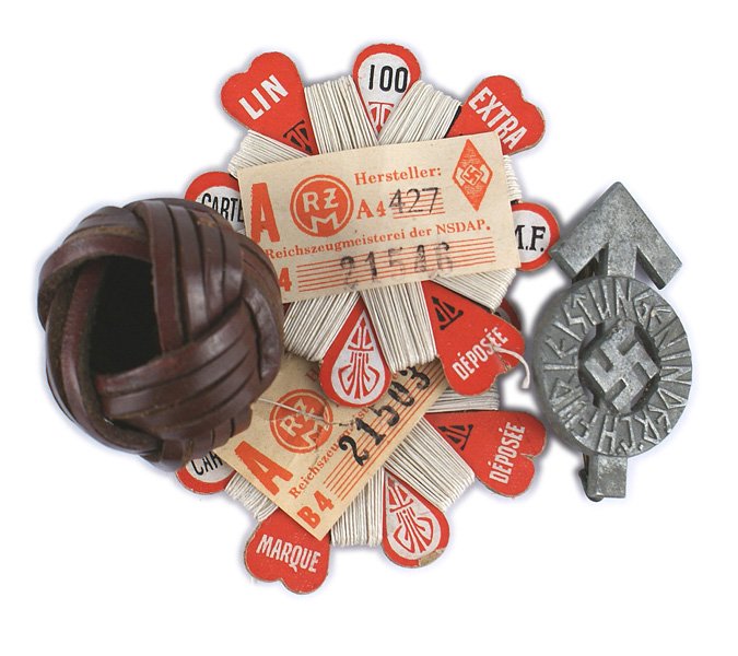 German WWII Hitler Youth lot Sports Badge thread: B-130 Miscellaneous German WWII Hitler Youth lot: (1) Sports Badge. Marked "B", "S" and "RZM M1/38". (2) Leather neckerchief slide. Two original period cloverleaf-shaped cards with white thread and "R