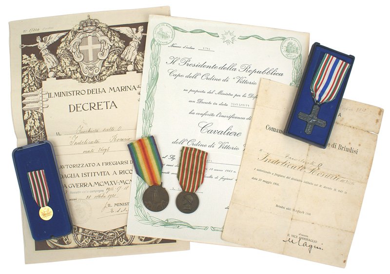 Italian WWI Naval grouping War Medal: B-222 Italy. WWI Naval grouping: (1) 1916 Navy certificate for "Stoker Rasario Indelicato". (2) 1915-1918 War Medal with award citation. (3) WWI Victory Medal. (4) Order of Vittorio Veneto - boxed wit