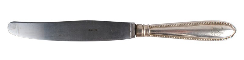 Adolf Hitler silvered dinner knife: A-014 Adolf Hitler "Dot" pattern 10 1/8" dinner knife. Engraved "AH" and marked "90". Excellent 5 1/2" blade is marked "ROSTFREI". II