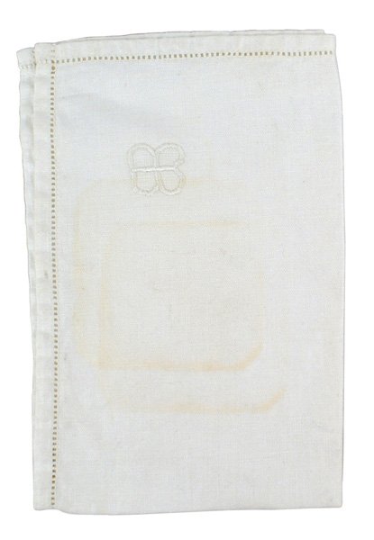 Eva Braun linen placemat: A-023 Eva Braun linen placemat. 10 1/2" x 16 1/4" with a perforated inner border. Relief embroidered "EB" butterfly monogram. Same pattern as tablecloth pictured on p. 39 "COLLECTOR'S GUIDE TO LIBERAT