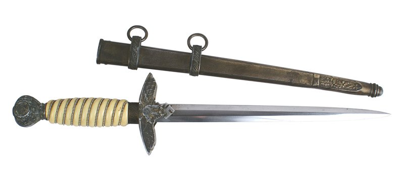 Luftwaffe 2nd Model dress dagger: D-007 Luftwaffe 2nd Model dress dagger with a silver wire wrapped white bakelite grip. Pommel and crossguard as above. Excellent 9 7/8" Eickhorn blade. Darkened patina on the two-ring scabbard. II