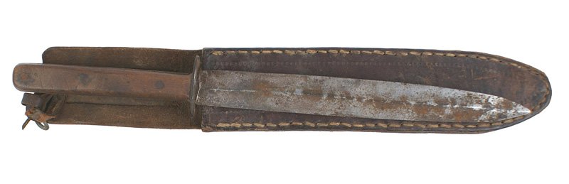 U.S. WWII GI handmade fighting knife: D-045 WWII GI handmade fighting knife. Narrow wood grips with 3 rivets and a short oval steel crossguard. Handmade 7/8" wide, double-edge 7 3/4" blade. Spotted pitting and light rust. GI made leather 