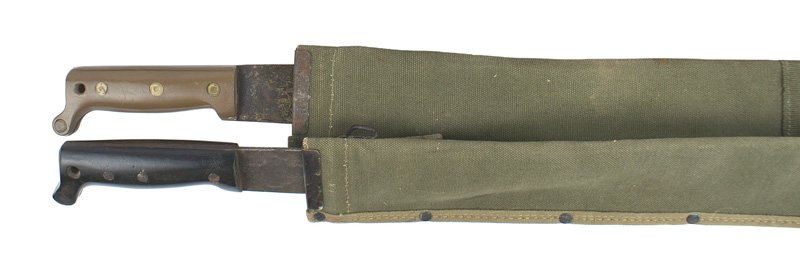 Lot of 2 U.S. WWII machetes: D-053 Lot of 2 U.S. WWII machetes: (1) Black bakelite grip. 18 1/8" darkened blade shows some wear. "COLLINS" marked O.D. web scabbard with a metal throat and belt loop. Marked "US" and "BOYT-44". (2)