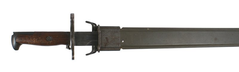 U.S. M1905 bayonet for Springfield/Garand: D-063 U.S. M1905 bayonet for the 1903 Springfield and M1 Garand. Wood grips with blued steel pommel and crossguard. 16" blade retains 70% of the original blue finish. Marked "US - 261916", also "RIA",