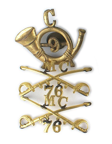 U.S. insignia lot Span-Am Period cap badge etc: K-071 Lot of 3 U.S. insignia: (1) Span-Am Period cap badge. Infantry horn with a "9" and a "C". Screw post on reverse. (2) Pair of Officer's Cavalry collar insignia. Gilt brass crossed swords with "MC