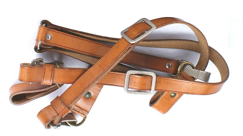 German WWII NSDAP Political Y straps: N-003 German WWII N.S.D.A.P. Political Leader "Y" straps. Light brown leather. Marked "STOLA". Pebbled silver snaps marked "RZM-M5" and "AU, "DRGM M5/289". Three matching belt loops with gold "D" ring