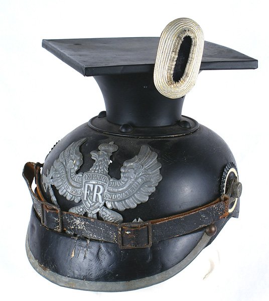 Imperial German Prussian EM Uhlan helmet: E-010 Imperial German Prussian EM Uhlan helmet. Solid black leather body with a gray metal trimmed (loose) visor. Wartime black metal base and removable square metal top. Gray smaller type Prussian Li