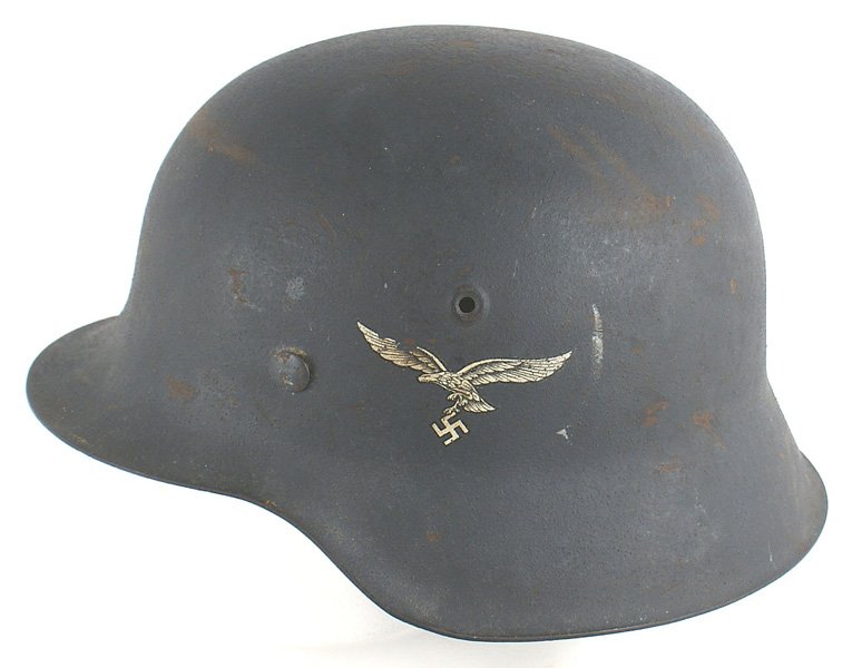 Luftwaffe M1942 single decal helmet: E-040 German WWII Luftwaffe M1942 single decal helmet. Original untouched blue-gray rough finish only shows several small paint chips. Eagle decal is basically intact except for a chip out of the top 