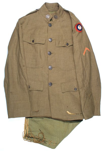 U.S. WWI 7th Aero Squadron uniform: F-063 U.S. WWI 7th Aero Squadron uniform: Wool four-pocket stand-up collar tunic. Has both collar discs - "US" and winged prop. Aero cockade with "7" shoulder patch. Gold O'seas and red Discharge chev