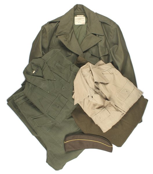 U.S. WWII Army WAC uniform grouping: F-073 U.S. WWII Army WAC uniform grouping: (1) Woman's M1943 field jacket. Five-button OD jacket with two pockets. Drawstring waist. Size 14R. (2) OD HBT two-pocket blouse and a summer light tan blous