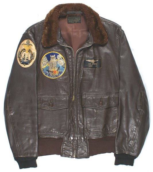 U.S. Navy Korean War leather flight jacket: F-085 U.S. Navy Korean War period leather flight jacket. Zippered front with two "patch" pocketes, a fur collar and knit cuffs and waist. Supple leather body. Large 4 ¾" diameter squadron patch on ri