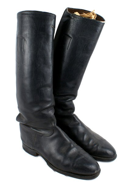 German WWII Officer black leather boots: F-136 German WWII Officer black leather boots. Knee-high type made of quality supple leather. Two period repairs. Original leather soles and heels with metal taps and heel rims. Size approximately 10.