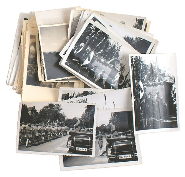 Lot of 56 personal Gauleiter Adolf Wagner photos: A-048 Lot of 56 personal Gauleiter Adolf Wagner 2 1/2" x 3 1/2" photos of reviewing SA men, a parade in Munich, ceremony at the Feldherrenhalle, at the speaker's rostrum, etc. (This offering of Gaulei