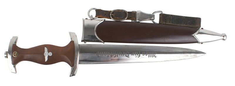 German WWII SA dagger: D-002 German WWII SA dagger. Some minute lifting of the plating on the edge of the top cross piece touching the wood. 8 3/4" blade is etched with the motto "Alles fur Deutschland". Reverse is marked "