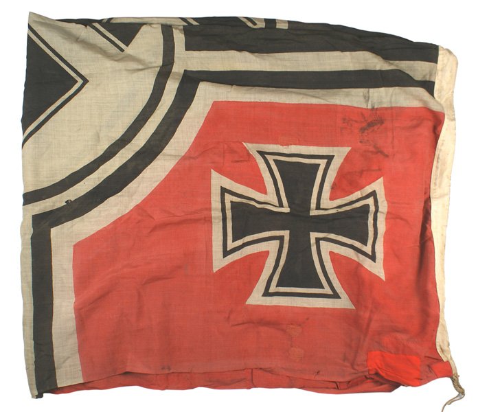 German WWII Navy Reichskriegsflagge flag: H-083 German WWII Navy "Reichskriegsflagge". Same type as above - but larger and with a stamped eagle/swastika/"M". Flag is well used and has been repaired by adding sections of red flag cloth to the 