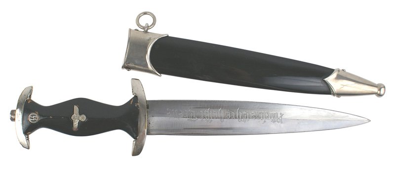 Reproduction German WWII SS EM dagger: H-194 Reproduction SS EM dress dagger. Slightly longer, out of proportion black wood grip. Top pommel piece is slightly smaller than the original. Clean blade has the SS motto and the reverse is marke
