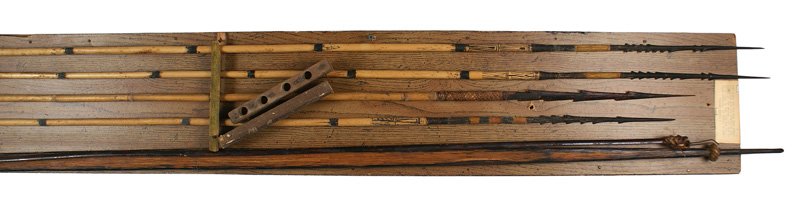 South Sea Islands weapons New Guinea: R-021 South Sea Islands weapons acquired in 1944 on the Island of New Guinea by a U.S. Navy See Bee. Included are a 72" bow with a rattan type drawstring. Bow is whittled down to a point on both ends 