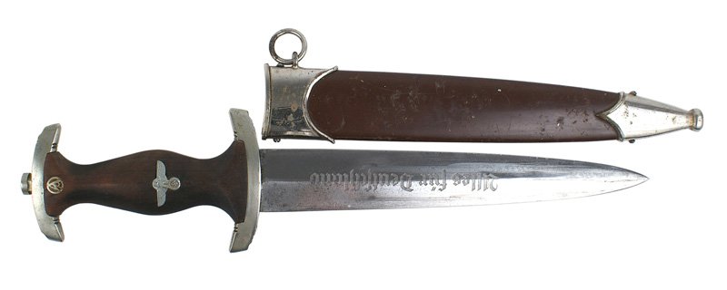 German WWII SA dagger: D-001 German WWII SA dagger. Age darkened rosewood grip with inserted "SA" and an eagle/swastika insignia. Age toned upper and lower crossguards marked "B" (Berlin - Brandenburg). 9 5/8" blade is engr