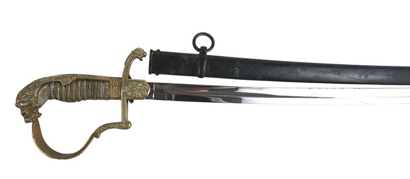 Imperial German Artillery Officer sword: D-032 Imperial Artillery Officer's dress sword. Red glass-eyed "lion head" pommel/floral backstrap and reverse "P" knuckle-bow with a crown/floral work and "WRII". Relief crossed cannons/floral work o