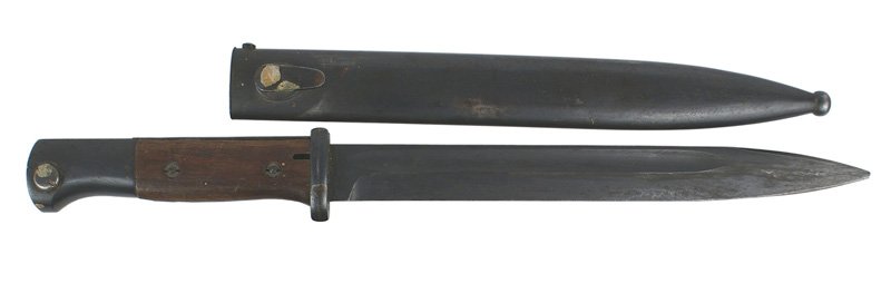 German WWII K-98 Mauser bayonet: D-051 K-98 Mauser bayonet. Plain wood grips. 90% of the original darkened blue finish on the pommel and crossguard remain. 9 3/4" blued blade is marked "CLEMEN & JUNG" and "3721C". Some minor wear to 