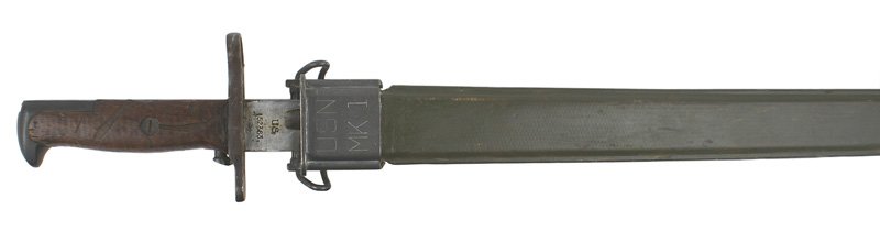 U.S. 1905 Springfield bayonet: D-057 U.S. 1905 Springfield bayonet. Wood grips and darkened pommel and crossguard. 16" clean blade marked with a flaming grenade, "SA" and "1906". Also marked "US 152363". With a green fiber "USN-MKI