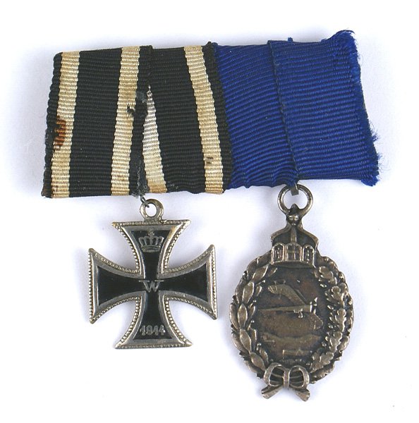 German WWI mini medals Pilot Badge IC: S-066 German WWI ribbon bar with miniature medals: Iron Cross (3/4" x 3/4") and Prussian Land Pilot's Badge. 1 1/8" x 3/4". Nice silver patina. II