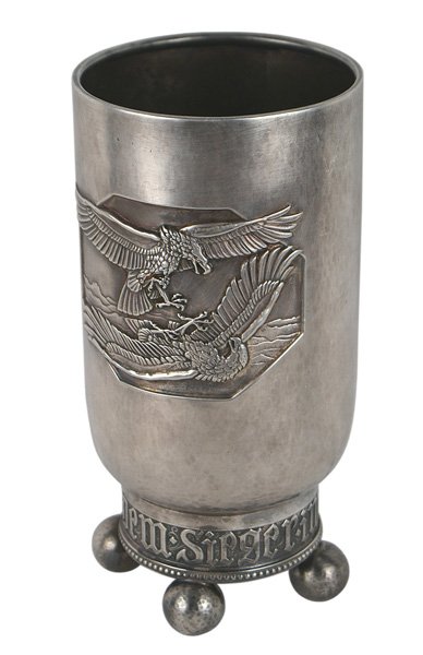 Imperial German WWI Pilot Victory Pokol: S-115 Imperial German WWI Pilot's Victory "Pokol". Late war type - in iron. Finely hammered body with a large embossed panel of two relief eagles in combat. 7" cup sits on a base band with relief lett