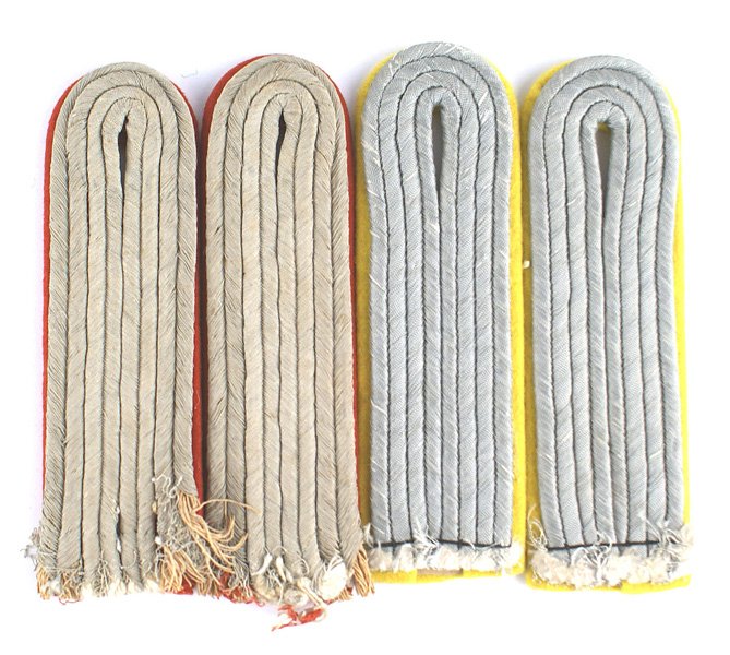 German WWII Army Lieutenant shoulder boards: H-034 Two pairs of German WWII Army Lieutenant sewn-in shoulder boards. Both field-type gray cord: (1) Artillery - on red backing. (2) Signal - on lemon yellow underlay. II