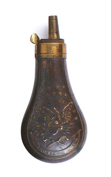 Civil War era Colt pocket model pistol flask: M-031 Civil War era Colt "pocket model" percussion pistol powder flask. Aged darkened body bearing a relief American eagle/shield, stars, crossed pistols and "E PLURIBUS UNUM". Spout and top of brass 