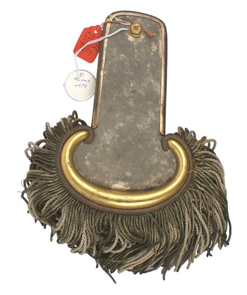 Civil War National Rifles single epaulette: K-011 National Rifles single epaulette. Brass outlined soft gray cloth, banjo shaped with a relief gilt metal crescent outlined with a silver wire cord. White cord/silver wire fringe. "NR" brass butto