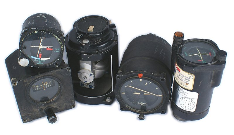 Lot of 5 U.S. WWII aircraft gauges: N-049 Lot of 5 U.S. WWII aircraft gauges: (1) Locater Range. Numbered "ID-249A/ARN". (2) Similar - but smaller and marked "LOCALIZER OR RANGE". Marked "MODEL 888 - TYPE 342". Dated "MAR 25 68". (3) Un