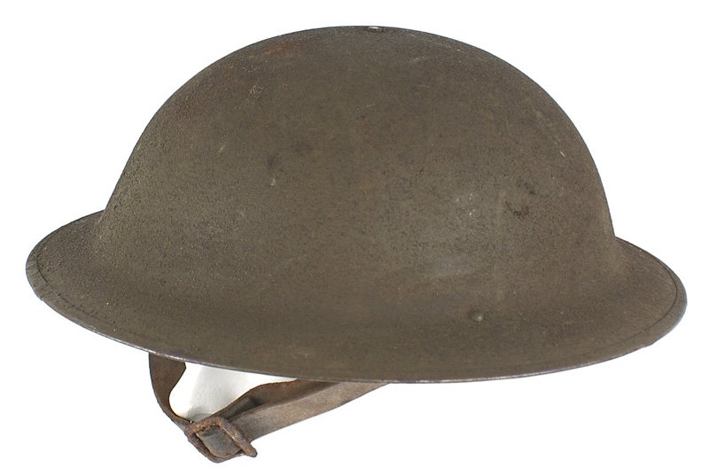 U.S. WWI doughboy helmet: E-039 U.S. WWI "doughboy" helmet. 98% original OD sand finish. Underside of back brim is stamped "Z457". Intact liner but strap shows age and buckle is rusted. II