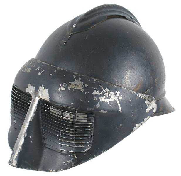 French WWI 2nd type Polack experimental helmet: E-061 French WWI 2nd type Polack experimental helmet. Visor and end attachments as above. Also shows paint chips and some light rust patches on back of helmet. Back inside brim has a cleaned rust patc