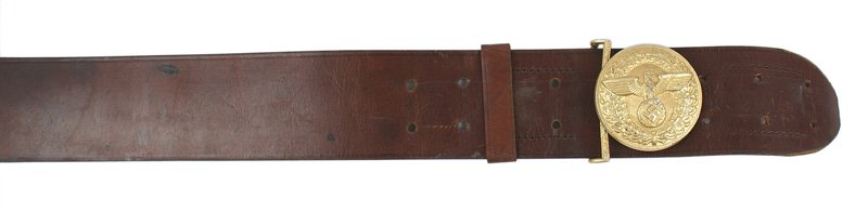 German WWII NSDAP belt: F-045 German WWII N.S.D.A.P. Leader's brown leather service belt and buckle. 2 1/4" wide belt has two slides. Round gilt buckle bears a relief political eagle/swastika on an oak leaf wreath. Reverse i