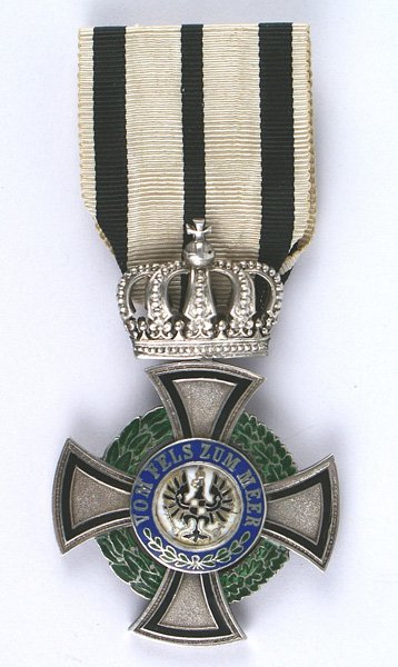 Imperial Prussian Hohenzollern eagle Cross: B-061 IMPERIAL GERMANY. Prussia. House Order of Hohenzollern, inhaber's eagle. Cross is of silver and enamel construction. Unmarked. Shows light wear/age and features separately applied center medalli