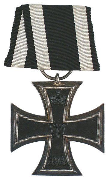 Imperial Prussian 1914 Iron Cross 2nd Class: B-082 IMPERIAL GERMANY. Prussia. 1914 Iron Cross 2nd Class. Crown/"W"/"1914" on black iron center. Reverse crown/"FW"/oak leaves/"1813". Silver frame with a nice purple patina. Original medal bar moun