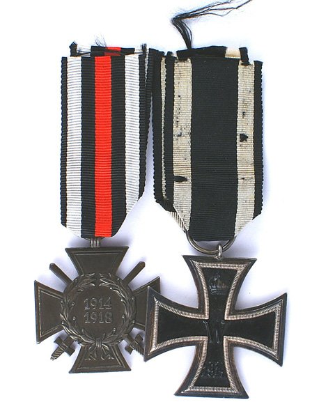 Imperial Prussian lot of 2 Iron Cross Combatants: B-086 IMPERIAL GERMANY. Prussia. Lot of 2: (1) 1914 Iron Cross. Darkened patina on the silver frame. Ring is marked "KO". Original ribbon. (2) 1914-1918 Combatants Cross. II