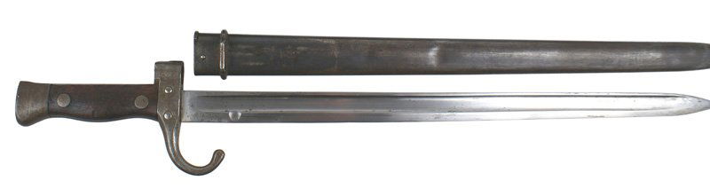 French M1892 knife bayonet: D-031 French M1892 knife bayonet. Second type with a shortened hooked guard and a "step back" muzzle ring. 15 5/8" clean blade. Serial number on crossguard. Darkened steel scabbard retains about 30% o