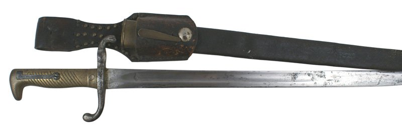 German Seitengewehr M1871 bayonet: D-032 German Seitengewehr M1871 bayonet. One-piece brass grip with a pronounced "bird head" pommel. Steel "S" shaped crossguard with a muzzle ring. Markings indicates issued to the 3rd Regiment, 3rd C