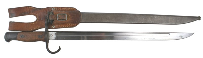 Japanese WWII Arisaka bayonet: D-042 Japanese WWII Arisaka bayonet. With hook guard. Clean 15 3/4" blade-marked with the Tokyo/Kokura Arsenal stamping. Back of the steel scabbard has 90% of the original blue finish, front has a lig