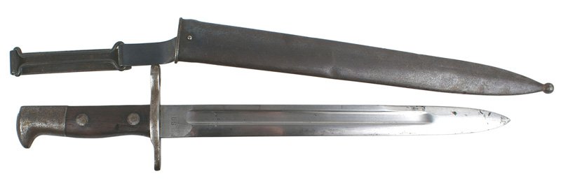 U.S. Krag M1892 bayonet: D-048 U.S. Krag M1892 bayonet. Steel pommel and crossguard/muzzle ring show some light pitting. Old small chip on the wood grip. 11 5/8" fairly clean blade. Marked "US" and dated "1898". Darkened blue