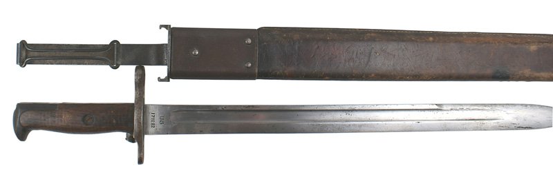 U.S. M1903 bayonet: D-050 U.S. M1903 bayonet. Steel pommel and crossguard/muzzle ring. Wood grips. Fairly clean 15 7/8" blade is marked "US", "179212" and "SA" over a flaming grenade and "1908". Leather covered scabbard 