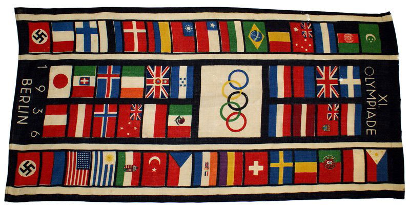 1936 German Berlin Olympics street flag: A-055 1936 Olympics street flag. This historic piece was removed from a lamp post on the Kaiserdam in Berlin in 1936, kept as a souvenir since that time and recently consigned to Mohawk Arms Auction 7