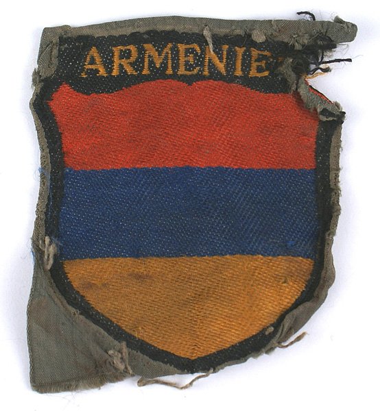 German WWII Armenien sleeve shield: H-093 German WWII "Armenien" bevo-embroidered volunteer sleeve shield. Was removed from a tunic. II-