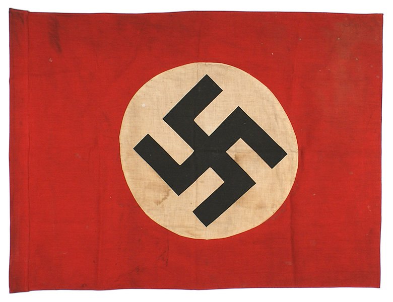 German WWII NSDAP flag: H-098 German WWII NSDAP flag. Printed black swastika on a white disc sewn to a red field. With a pole sleeve. Stained and soiled from field use. 21 1/2" x 29 1/2". Ideal for a display backdrop. II-