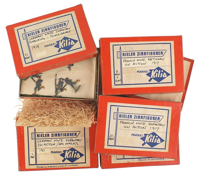 German made pewter toy soldiers lot: H-142 Lot of German made flat pewter toy soldiers. All in six original "KIELER ZINNFIGUREN" boxes. "MADE IN WESTERN ZONE OF GERMANY". Includes: (1) Eighteen WWI German Attacking Infantry. All painted 