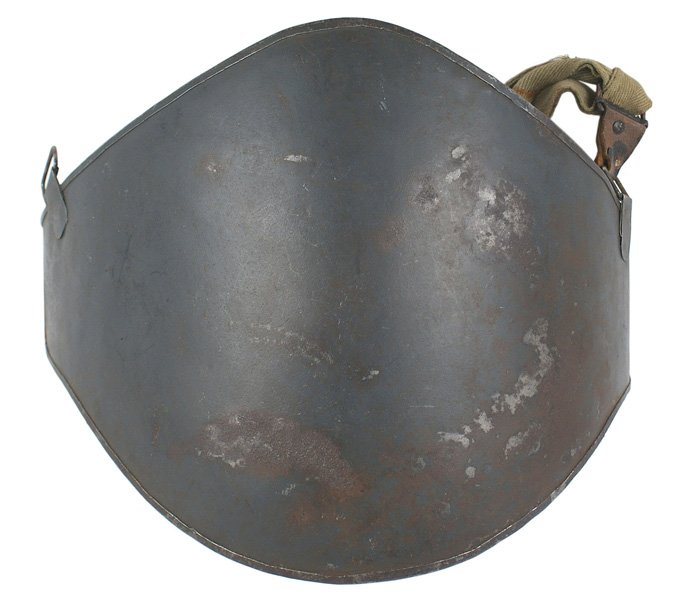 French WWI Adrian Abdominal Plate: H-182 "Cuirasse Abdominale". Armor plate as above. Several cleaned rust patches and paint chips. 75% of the original horizon blue finish remains. Reverse has some cleaned rust areas - but retains 65% 