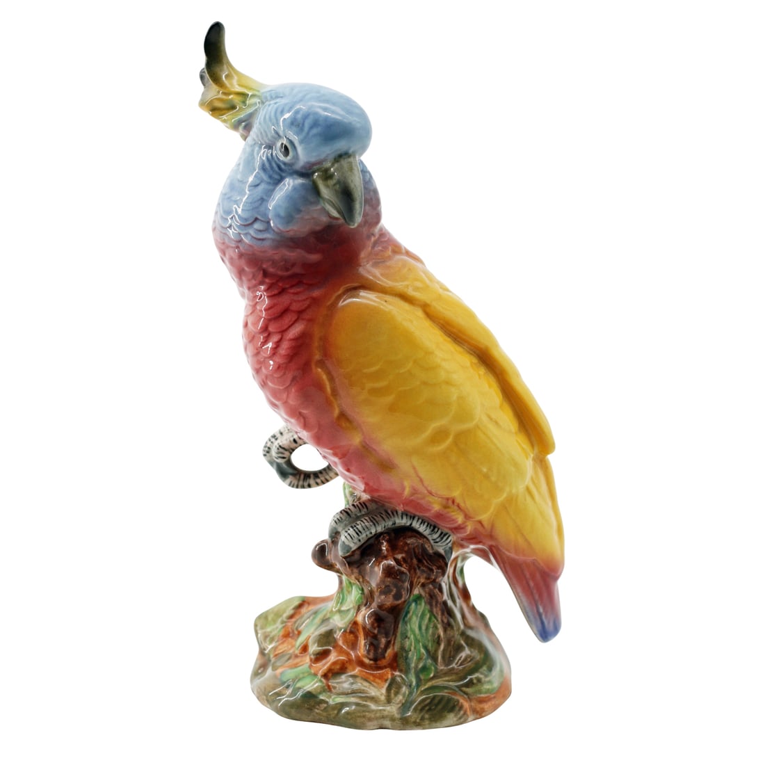 Beswick Cockatoo Figurine: A vibrant mida'20th-century cockatoo by J. W. Beswick (Staffordshire, England). Hand-painted in sunburst yellow, coral, and sky blue with a high-gloss glaze, this 8A12a'inch model perches on a natural